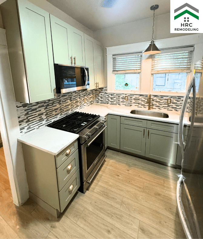 green shaker cabinets with glass mosaic backsplash gold handles kitchen remodel