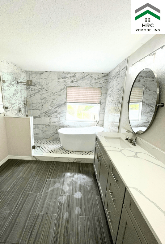 large walk in shower with freestanding tub and custom vanity
