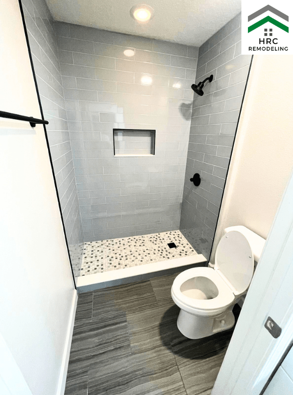 blue subway tile tub to shower conversion