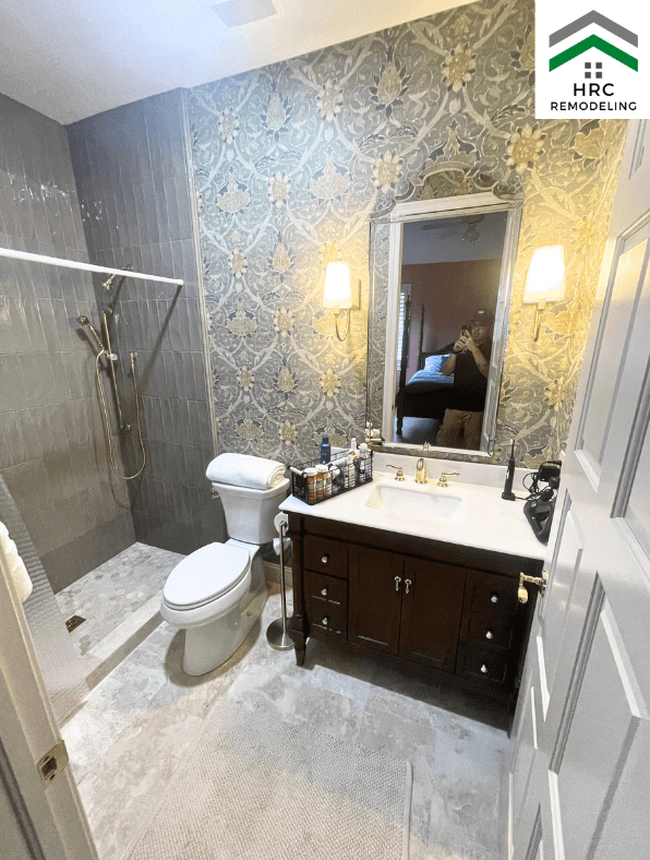 green bathroom with wallpaper