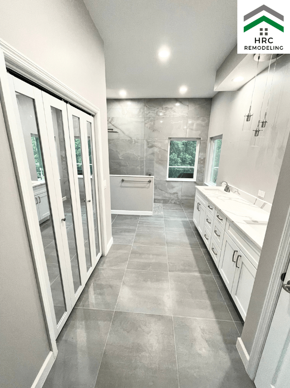 large master bathroom with large format tiles