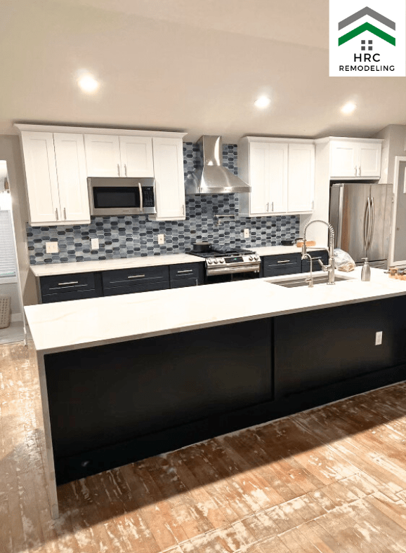 kitchen remodel white and blue shaker cabinets with blue backsplash