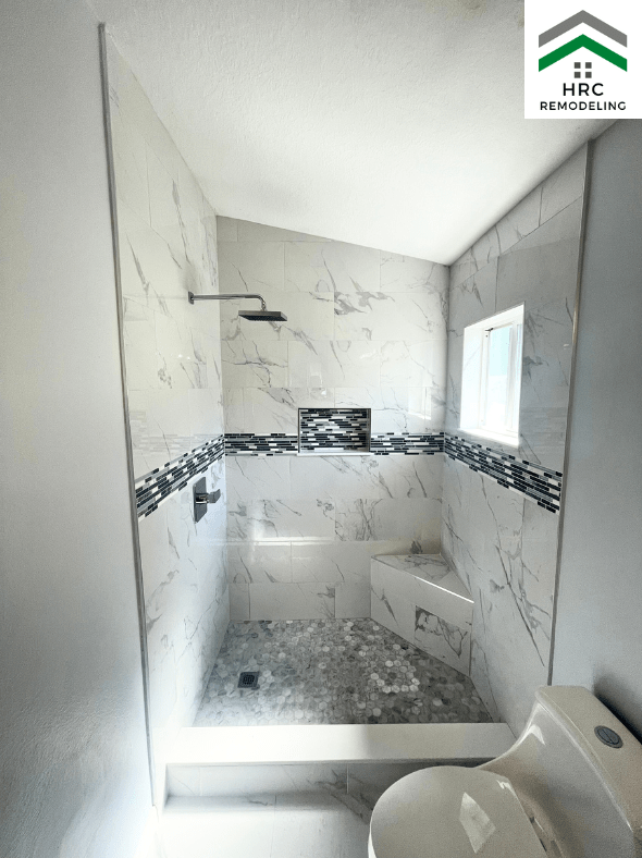 shower remodel white calcutta