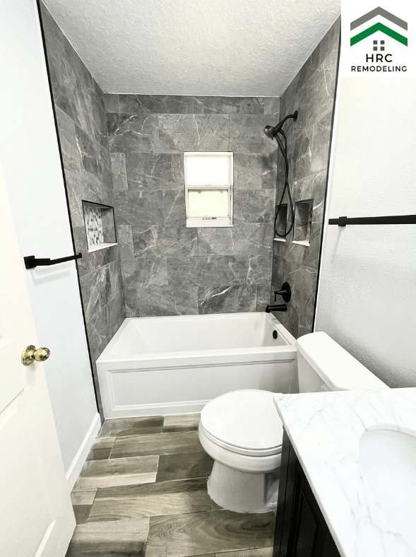 concrete imitate bathroom tiles with tub