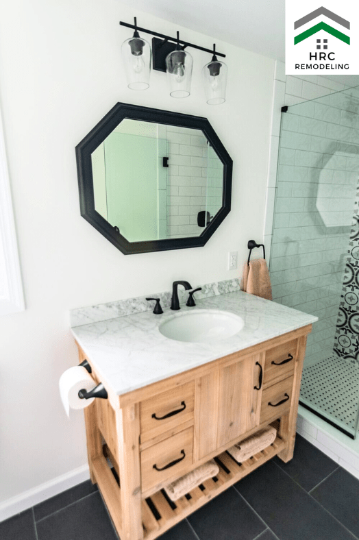 bathroom wooden vanity with mirror and lights