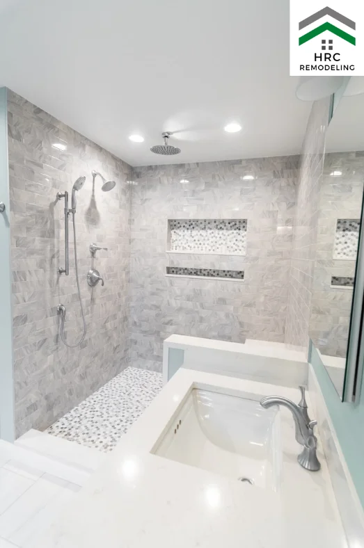 bathroom remodel with ceiling shower head and shampoo box