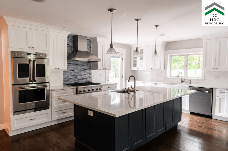 white and blue shaker cabinets with wall oven